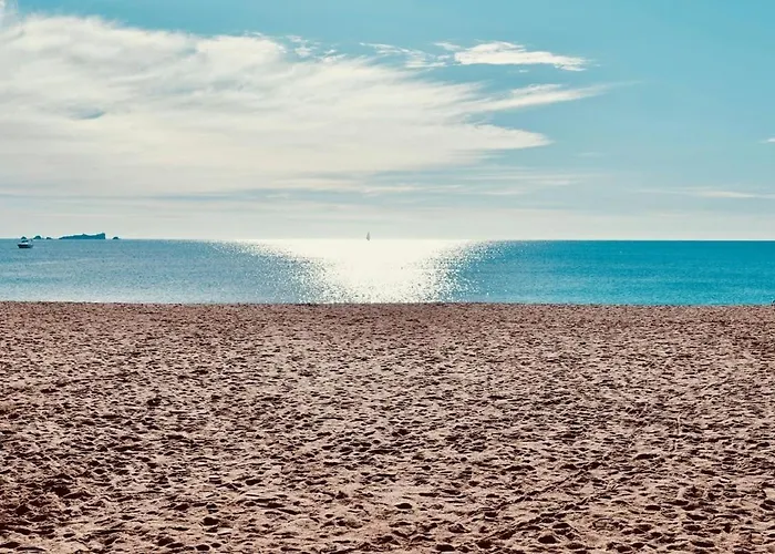 Appartement Vacances tout confort au bord du sable fin